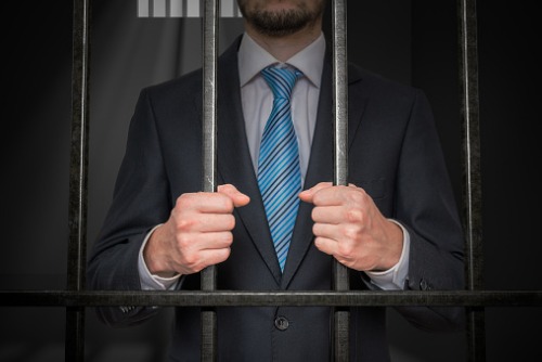 Personal banker jailed for cheating and forgery in Singapore