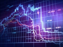 QBE reveals predicted $1.2 billion loss